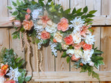 Wedding Arch flowers in Coral and Ivory