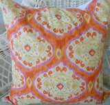 Bright orange and pink ikat pillow cover